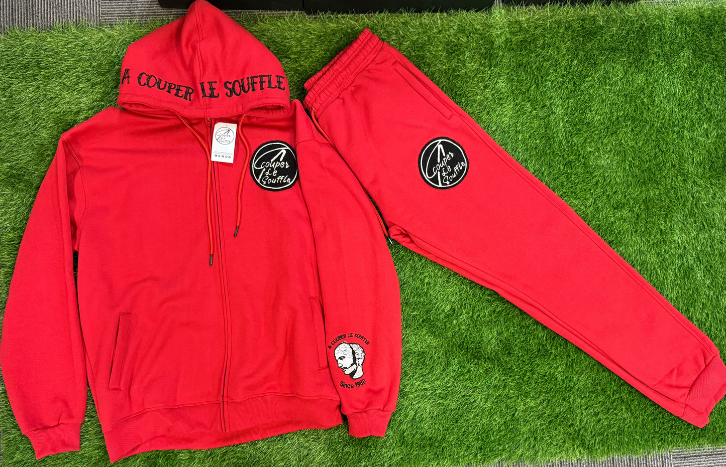 A Couper Le Souffle Unisex Red SweatSuit Logo